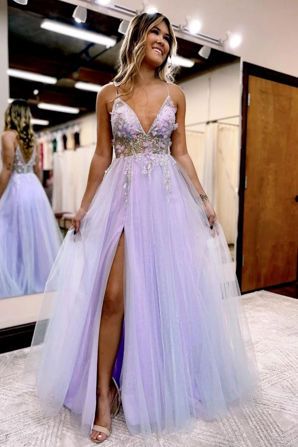 Lilac long prom dress with spaghetti straps and a front split in A-line style