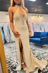 Long Champagne Mermaid Prom Dress with Sparkly Sequins and Halter Neckline Featuring a Slit