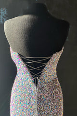 Long Strapless White Prom Dress Featuring Sequins and a Front Split