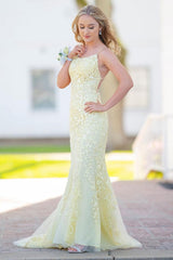 Prom Dress with Blue Spaghetti Straps and Backless Appliques