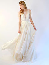 A-line Illusion Chiffon Tulle Sweep Train Wedding Dress With Ruffles