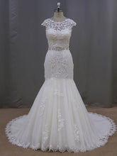 Elegant Trumpet/Mermaid Illusion Tulle Court Train Wedding Dress with Beading