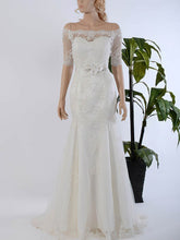 Luxurious Trumpet/Mermaid Off-the-shoulder Tulle Sweep Train Wedding Dress With Appliques Lace
