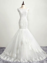Glamorous Trumpet/Mermaid Illusion Tulle Sweep Train Wedding Dress With Appliques Lace