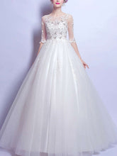 Glamorous Ball Gown Wedding Dress with Beaded Illusion Tulle