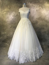 Off-the-shoulder Tulle Court Train Wedding Dress with Beading for a Ball Gown Look