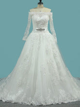 Elegant Off-the-shoulder Tulle Court Train Wedding Dress with Appliques Lace
