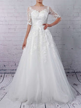 Illusion Tulle Ball Gown Wedding Dresses with Beading and Sweep Train