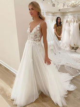 V-neck Tulle Ball Gown Wedding Dress with Appliques Lace and Sweep Train