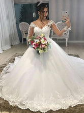Ball Gown Illusion Tulle Chapel Train Wedding Dress With Beading
