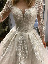 Illusion Tulle Ball Gown Wedding Dress with Beading and Sweep Train