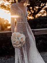 Glamorous A-line V-neck Glitter Sweep Train Wedding Dresses