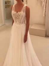 V-neck Tulle Ball Gown Wedding Dress with Appliques Lace & Sweep Train