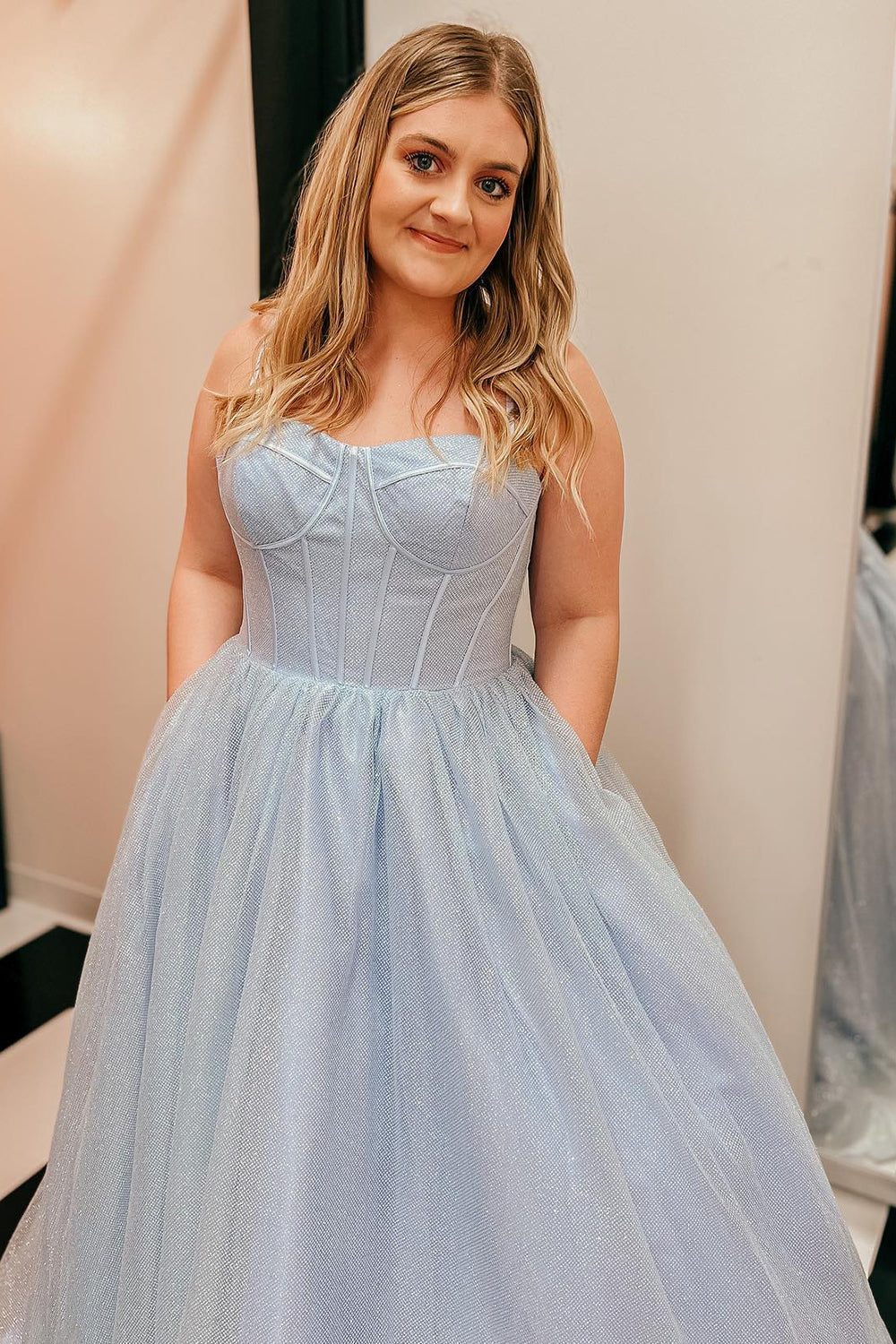 Light purple long prom dress with spaghetti straps in an A-line cut