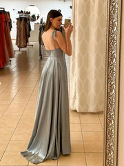 Light green long A-line prom dress with spaghetti straps and slit