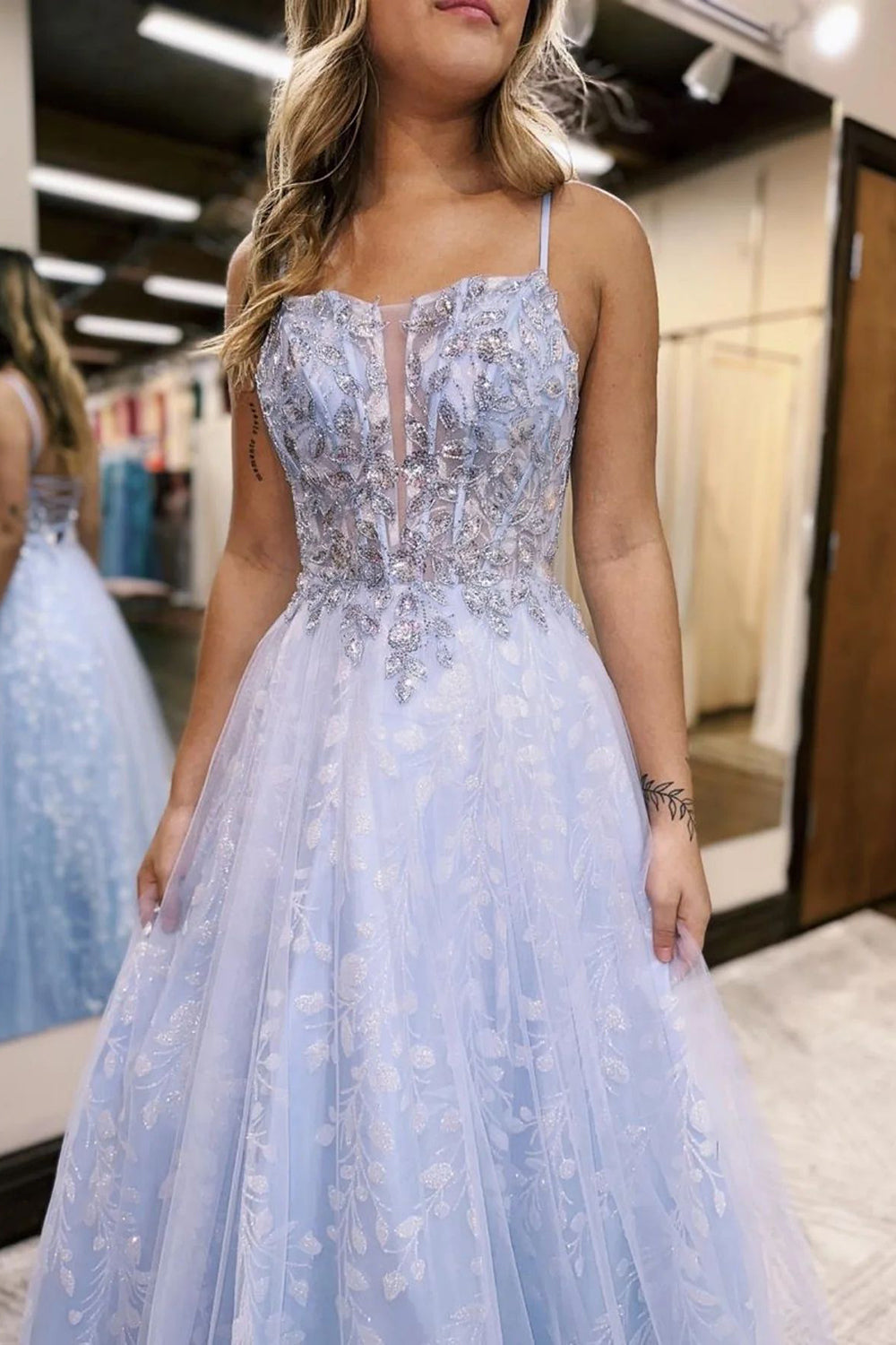 Lilac long prom dress with spaghetti straps and a front split in A-line style