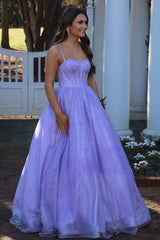 Light purple long prom dress with spaghetti straps in an A-line cut