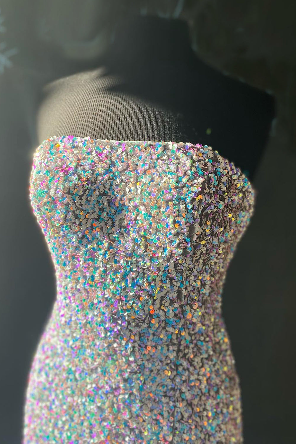 Long Strapless White Prom Dress Featuring Sequins and a Front Split