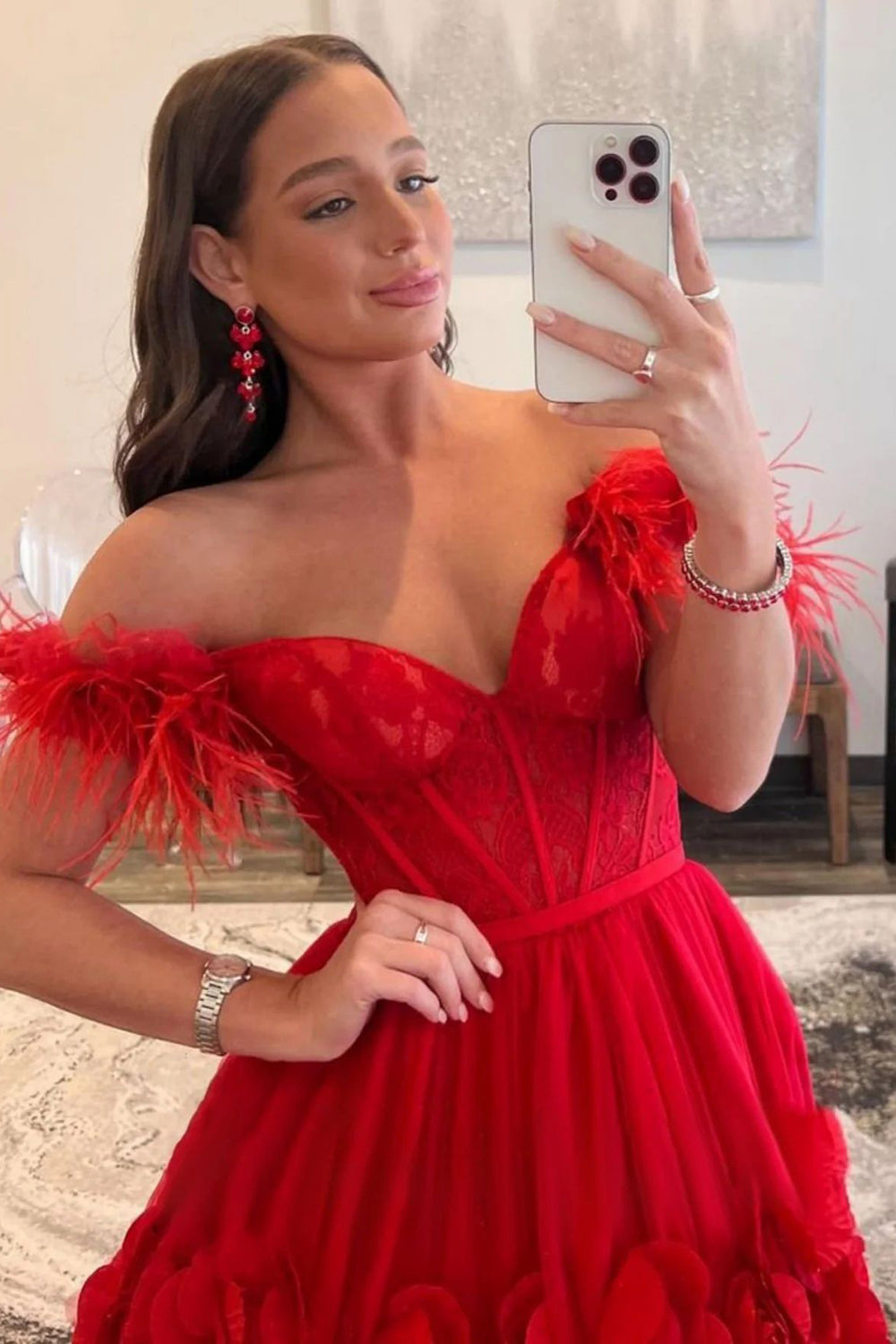 Long Red Prom Dress with Feathers in an Off-the-Shoulder A-Line Design