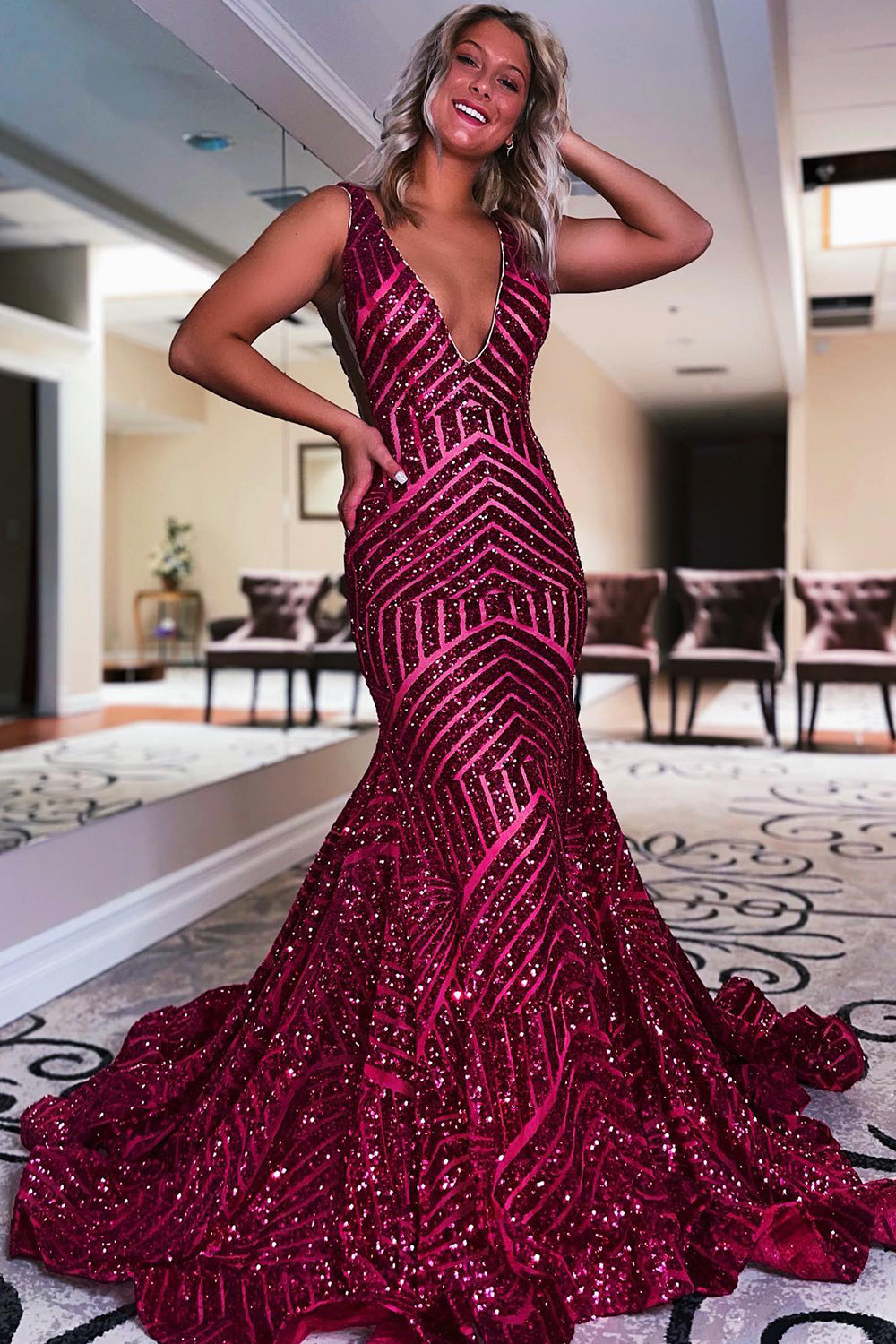 Long Prom Dress with Sparkly Blue Mermaid Cut and Red Sequins in Deep V Neck