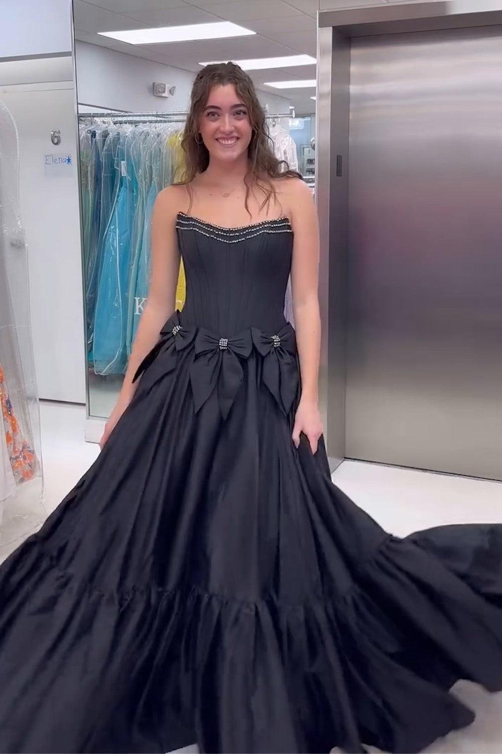 Long Black Satin A-Line Corset Prom Dress with Strapless Design and Bows