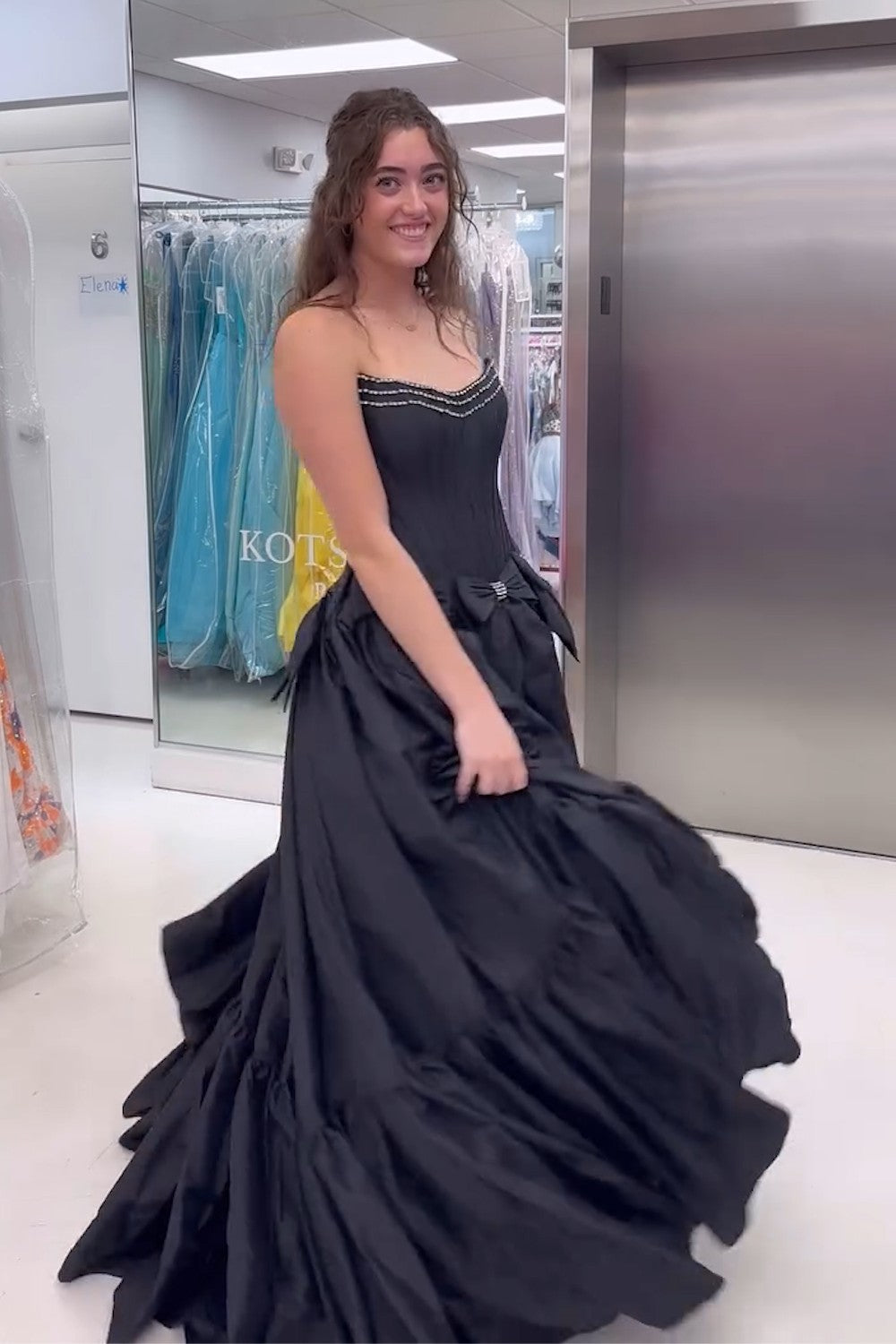 Long Black Satin A-Line Corset Prom Dress with Strapless Design and Bows