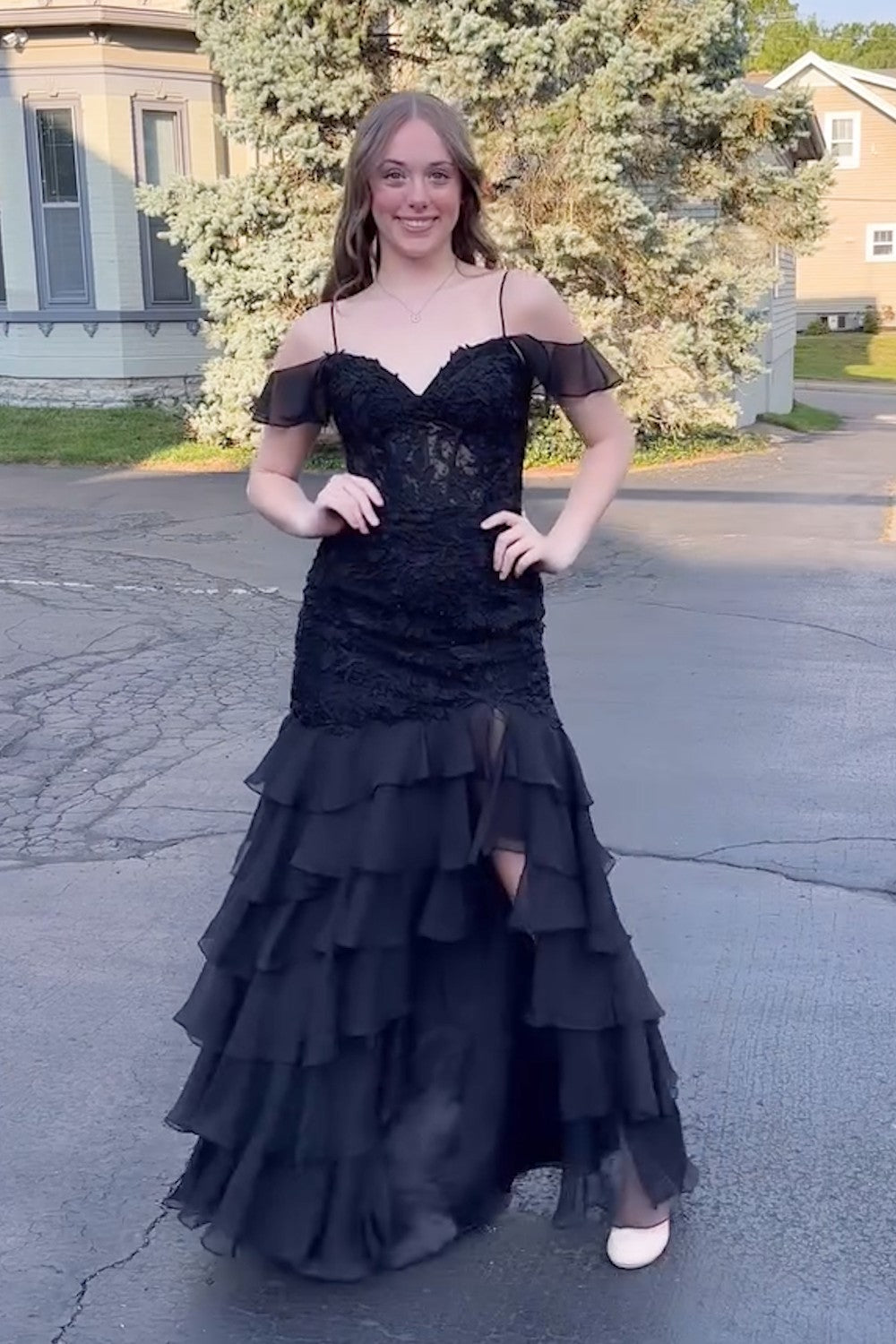 Long Black Chiffon Prom Dress with Cold Shoulder and Tiered Mermaid Hem Embellished with Appliques