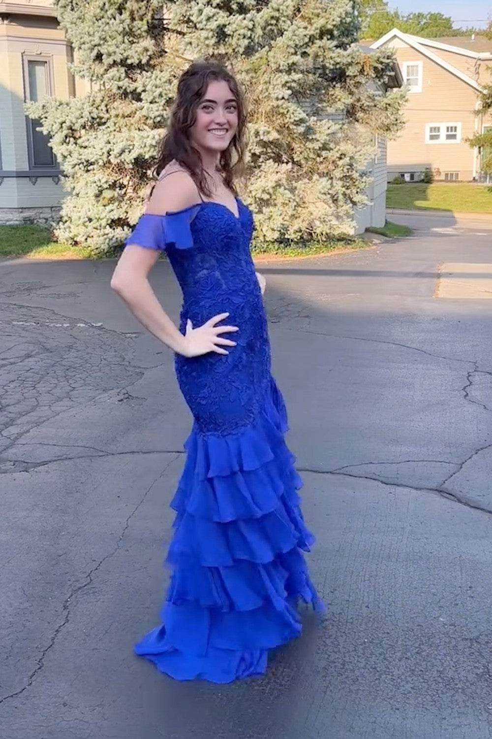 Long Black Chiffon Prom Dress with Cold Shoulder and Tiered Mermaid Hem Embellished with Appliques