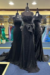 Long Prom Dress in Sparkly Black with Mermaid Cut-out and Spaghetti Straps Featuring a Bow