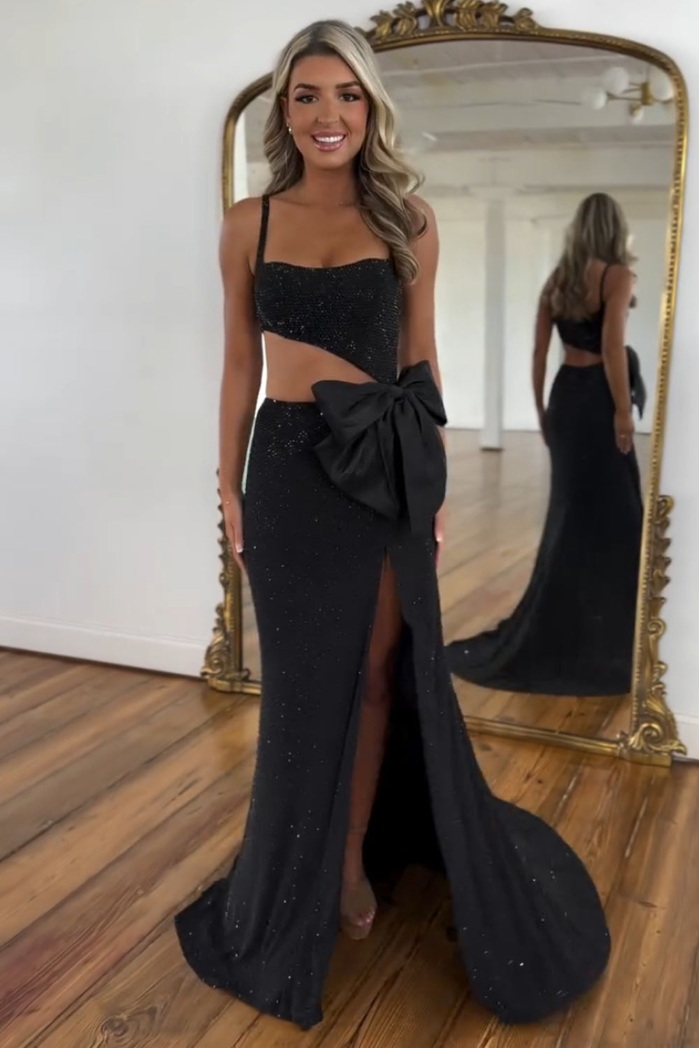 Long Prom Dress in Sparkly Black with Mermaid Cut-out and Spaghetti Straps Featuring a Bow