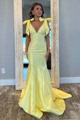 Yellow Beaded Mermaid Prom Dress with Glitter and Bows in a Deep V-Neck