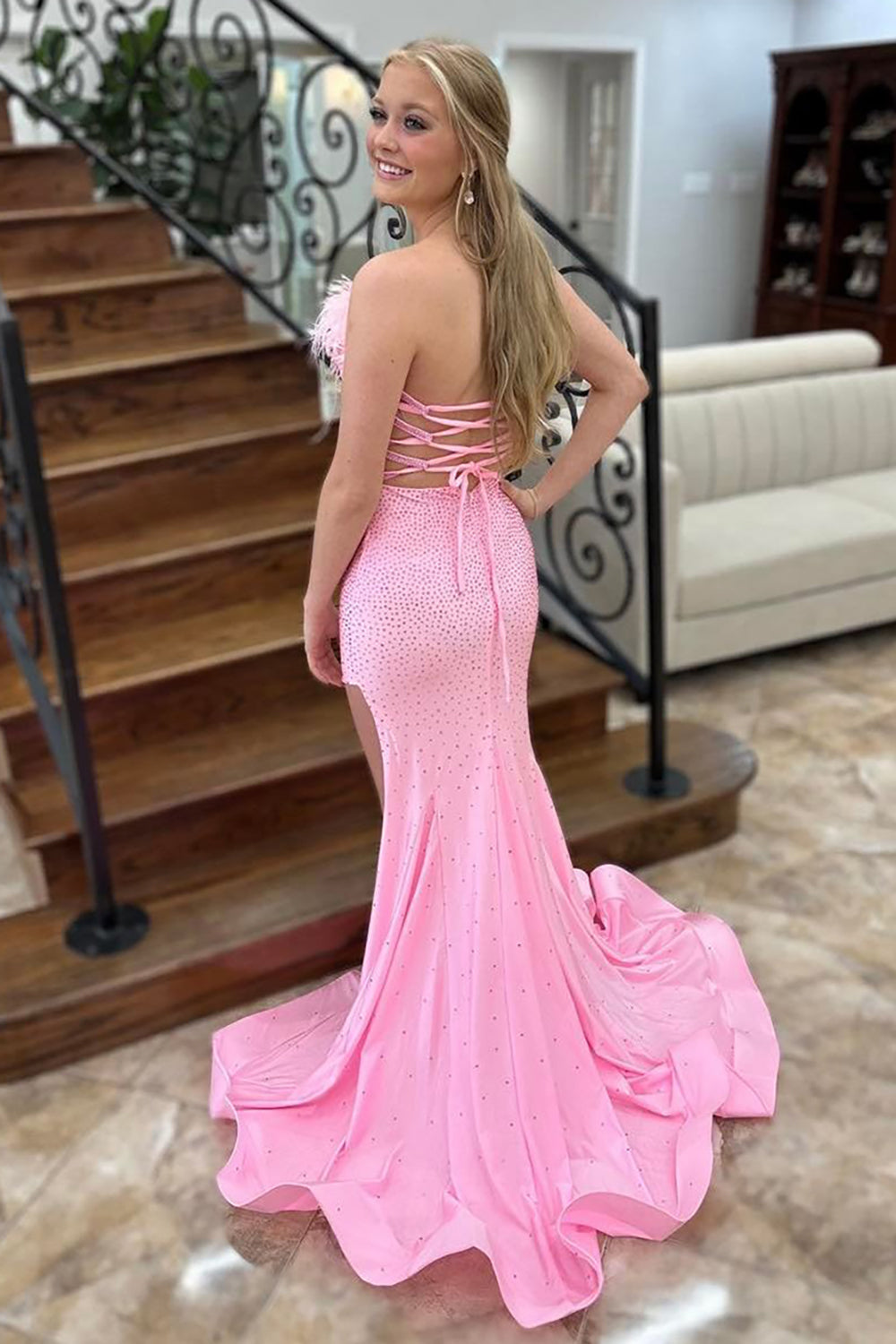 Long Pink Beaded Mermaid Prom Dress with Feathers and a Strapless Slit Design