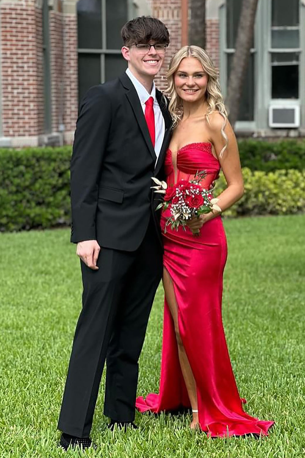 Long Red Satin Sweetheart Mermaid Prom Corset Dress Featuring a Slit