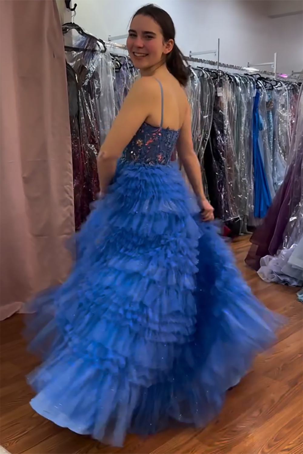 Long Fuchsia Prom Dress with Tiered Tulle and Spaghetti Straps Adorned with Princess Appliques