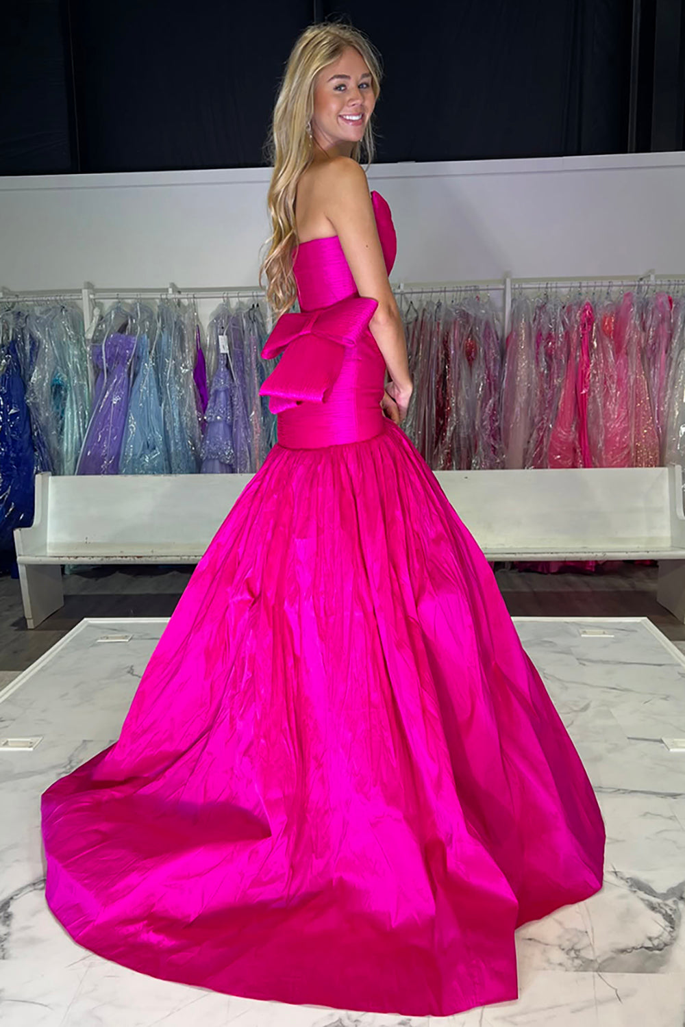 Long Strapless Satin Prom Dress in Fuchsia with Ruched Mermaid Design and Bow