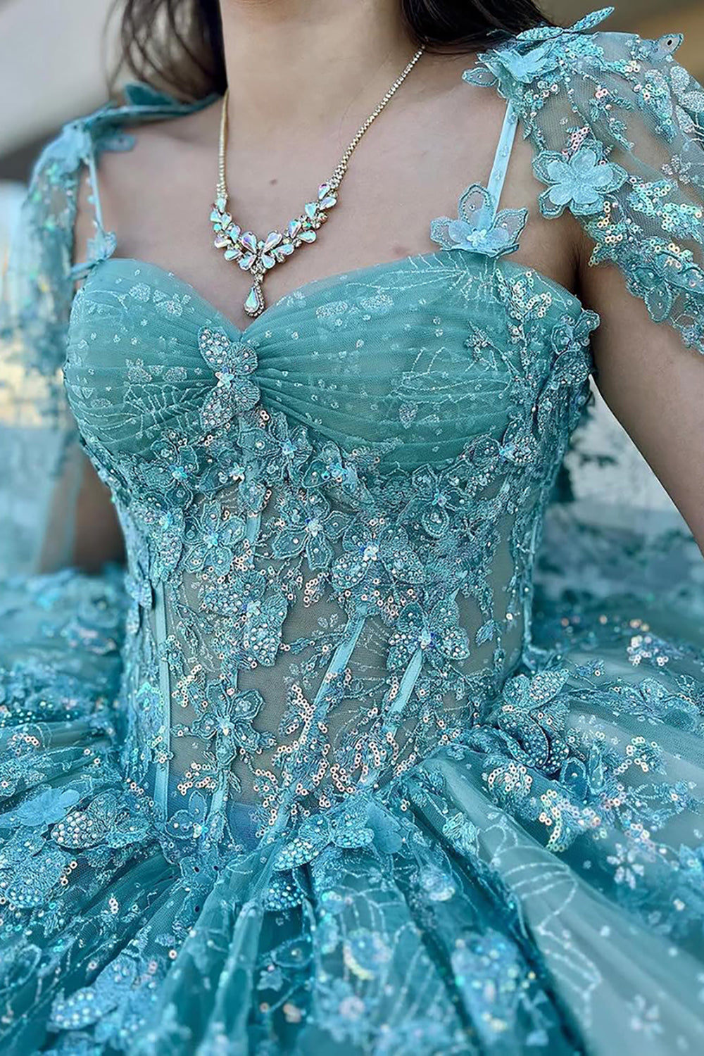 Champagne Blush Quinceanera Dress with Spaghetti Straps, Tulle Cape, and Appliques