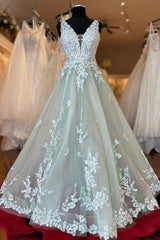 Elegant Light Green A-Line Prom Dress with Deep V-Neck and Appliques