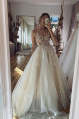 Long Ivory Prom Dress Featuring Appliques