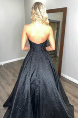 Long Beaded Black Corset Prom Dress Featuring a Sweetheart Princess Cut and Bow