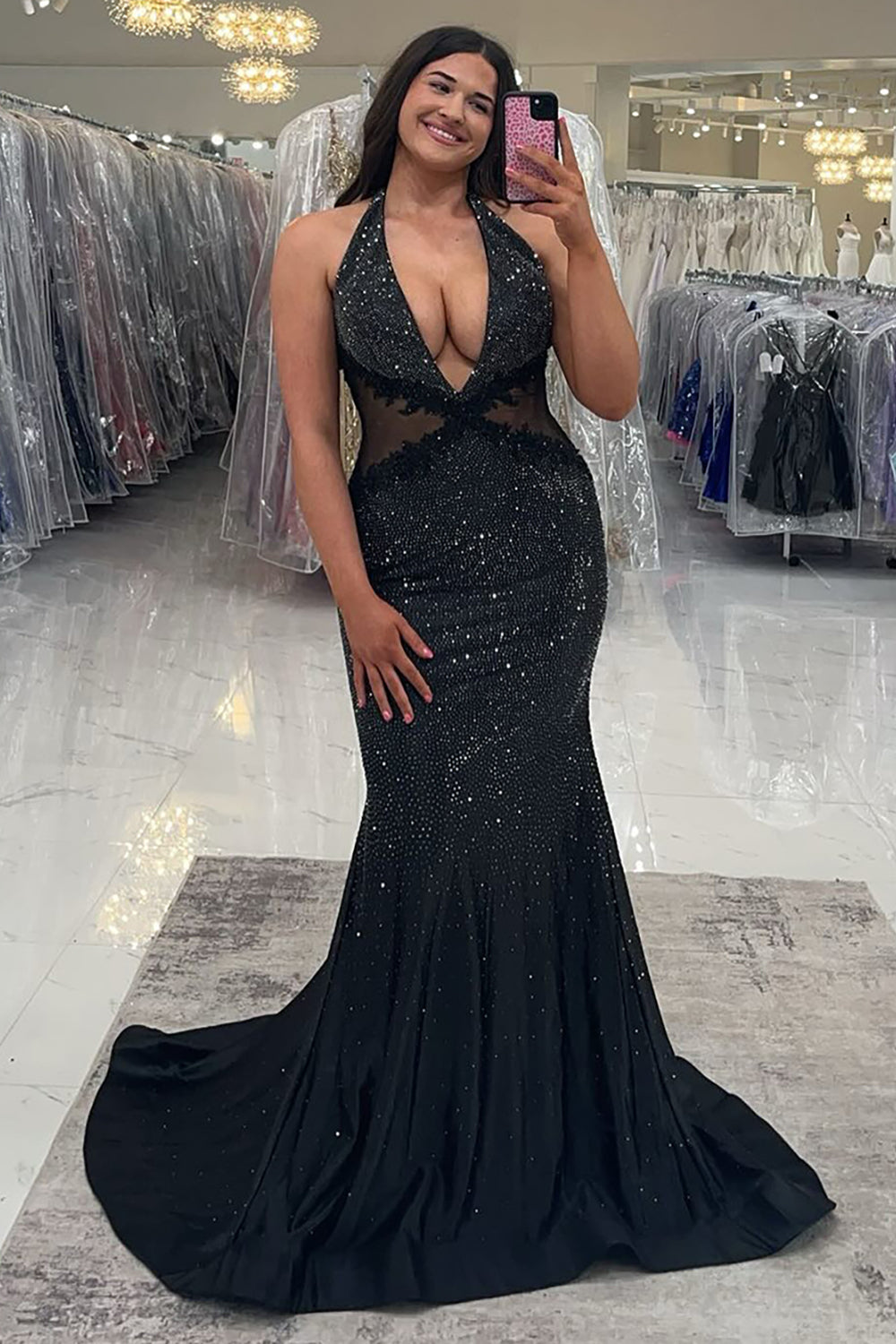 Long Beaded Black Prom Dress with Sparkly Halter and Backless Design Featuring Appliques