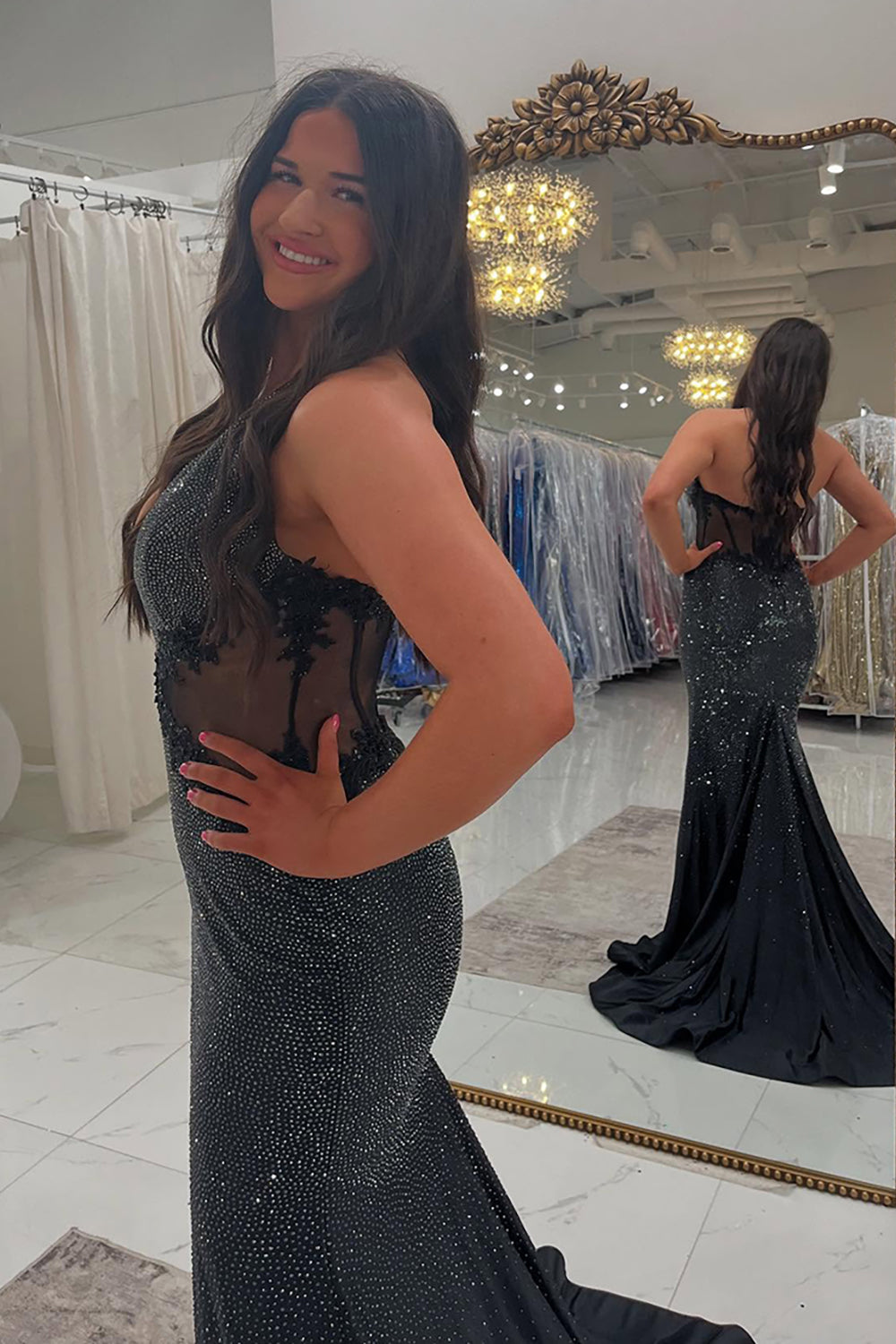 Long Beaded Black Prom Dress with Sparkly Halter and Backless Design Featuring Appliques