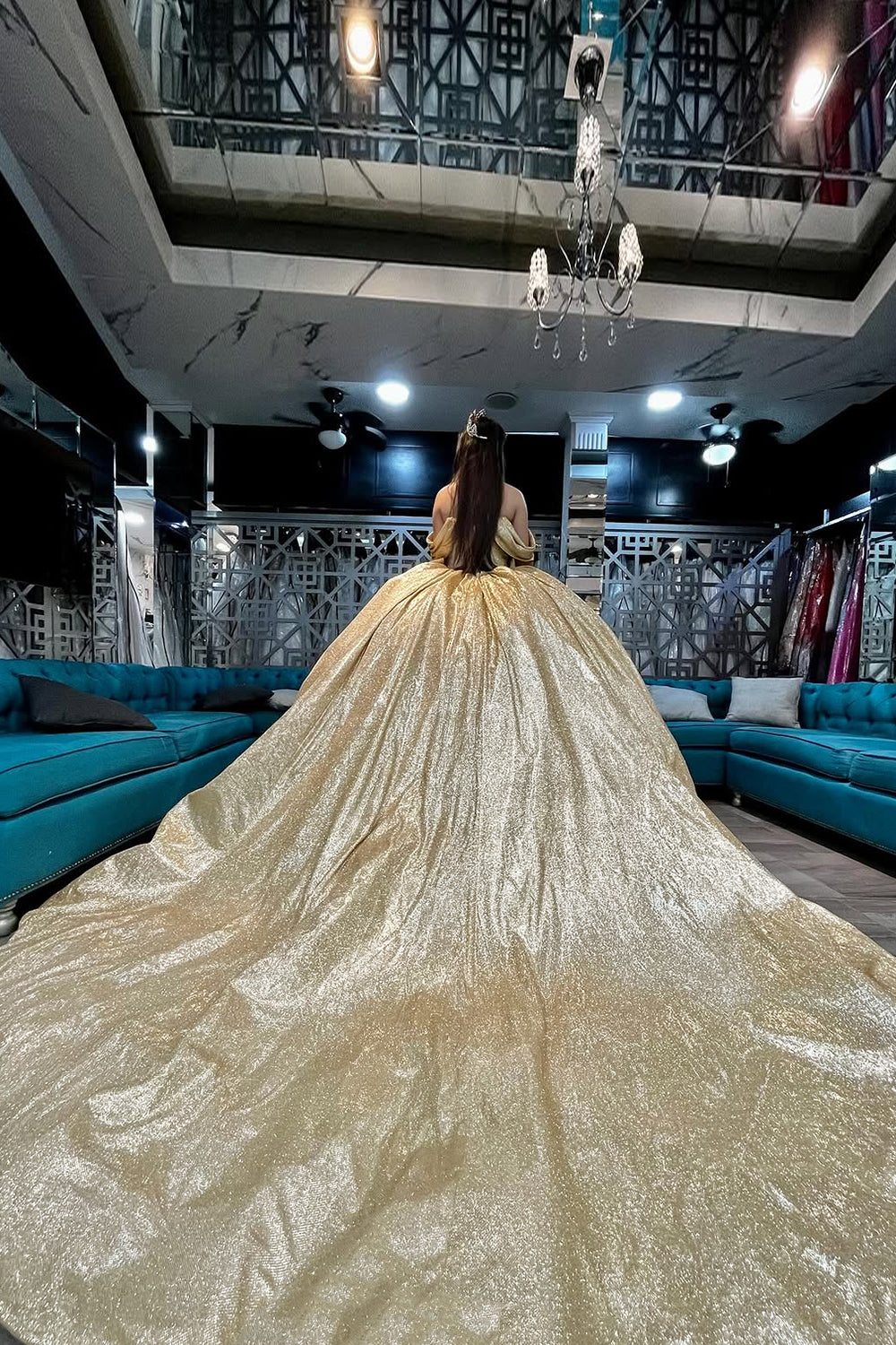 Golden Off-the-Shoulder Quinceanera Ball Gown with Sparkly Train