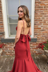 Long Red Prom Dress with Deep V-Neck Mermaid Cut and Spaghetti Straps Featuring a Bow