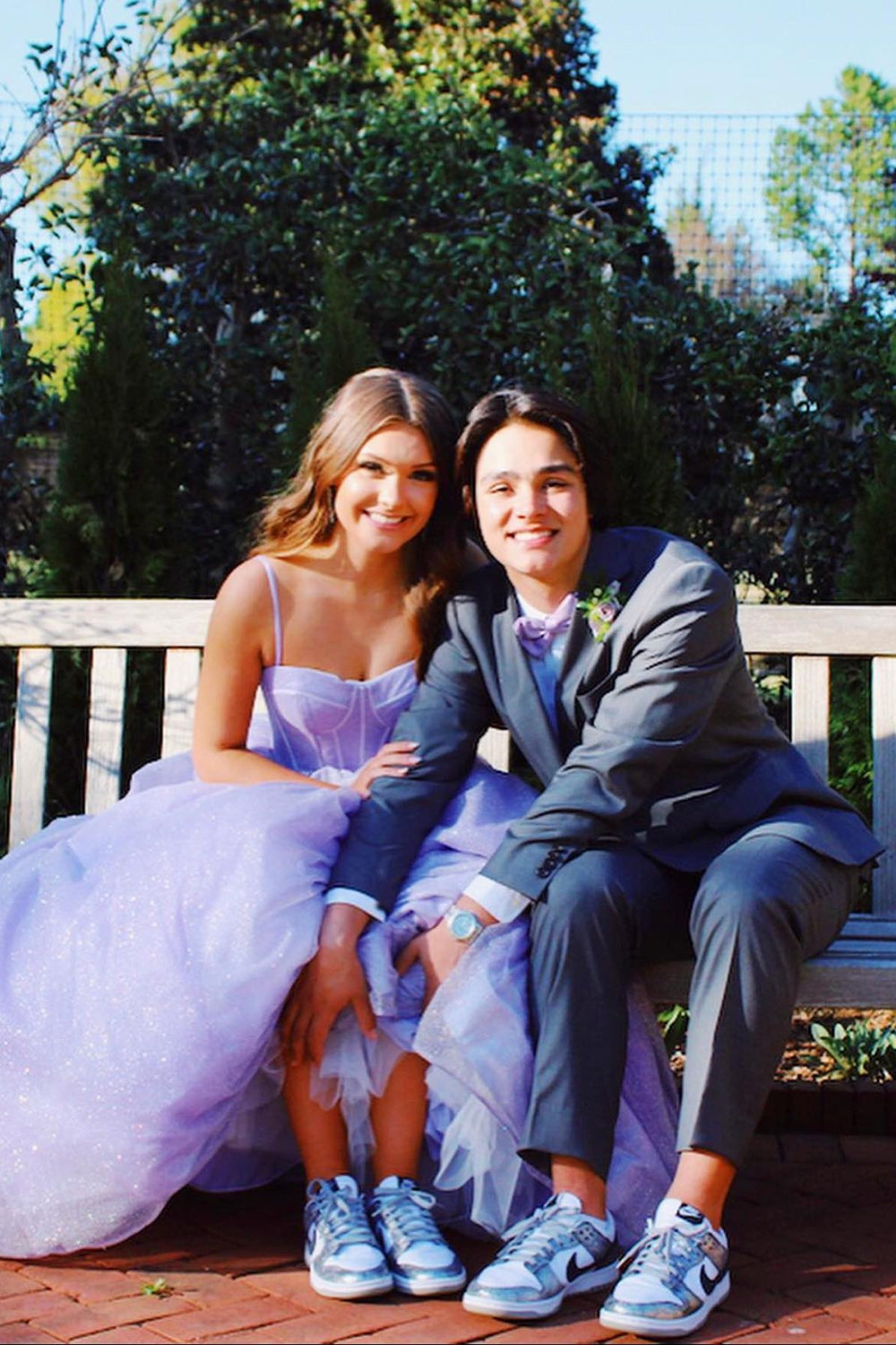 Light purple long prom dress with spaghetti straps in an A-line cut