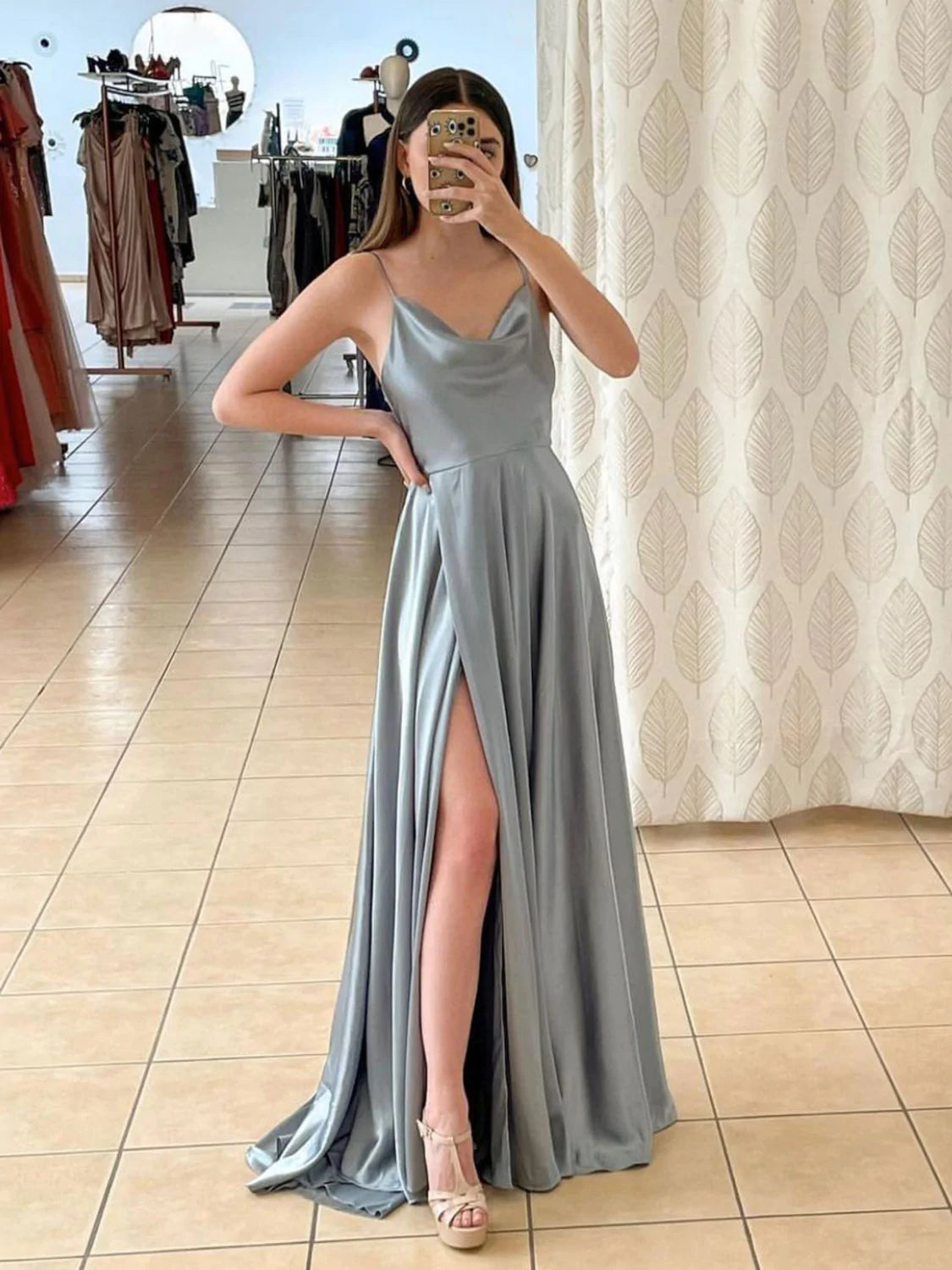 Light green long A-line prom dress with spaghetti straps and slit
