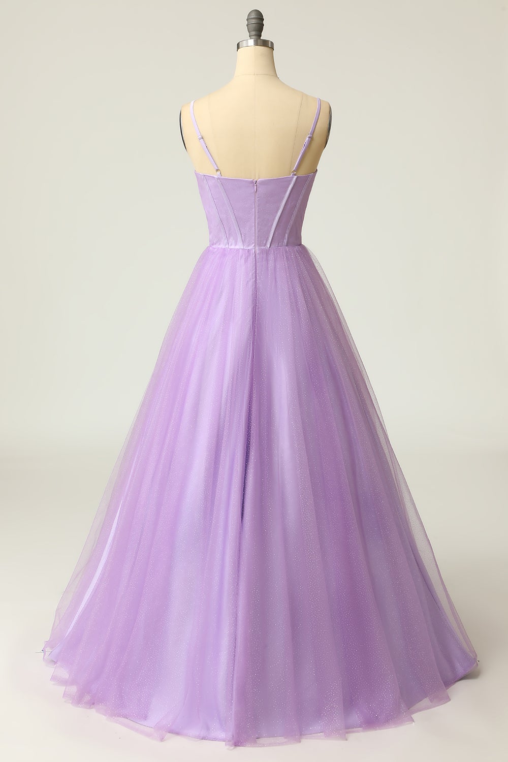Light purple long prom dress with spaghetti straps in an A-line cut