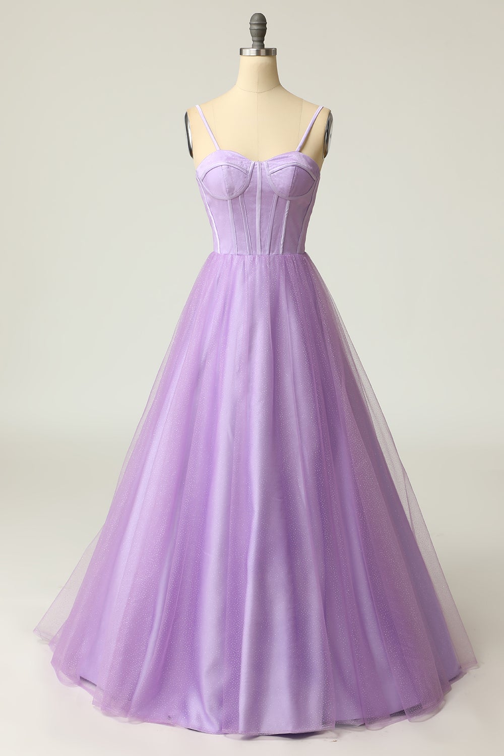 Light purple long prom dress with spaghetti straps in an A-line cut