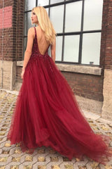 Long Beaded Prom Dress in Burgundy with a Slit