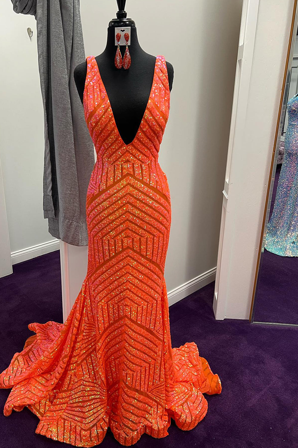 Long Prom Dress with Sparkly Blue Mermaid Cut and Red Sequins in Deep V Neck
