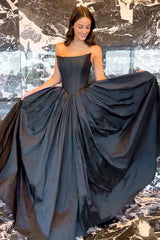 Black Strapless A-Line Prom Dress Featuring a Criss-Cross Back